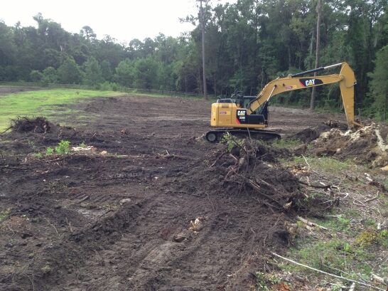 Land clearing equipment at work